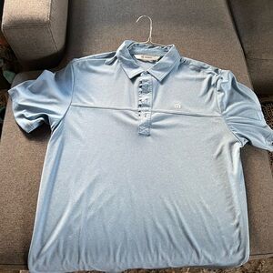 Travis Mathew light blue golf polo